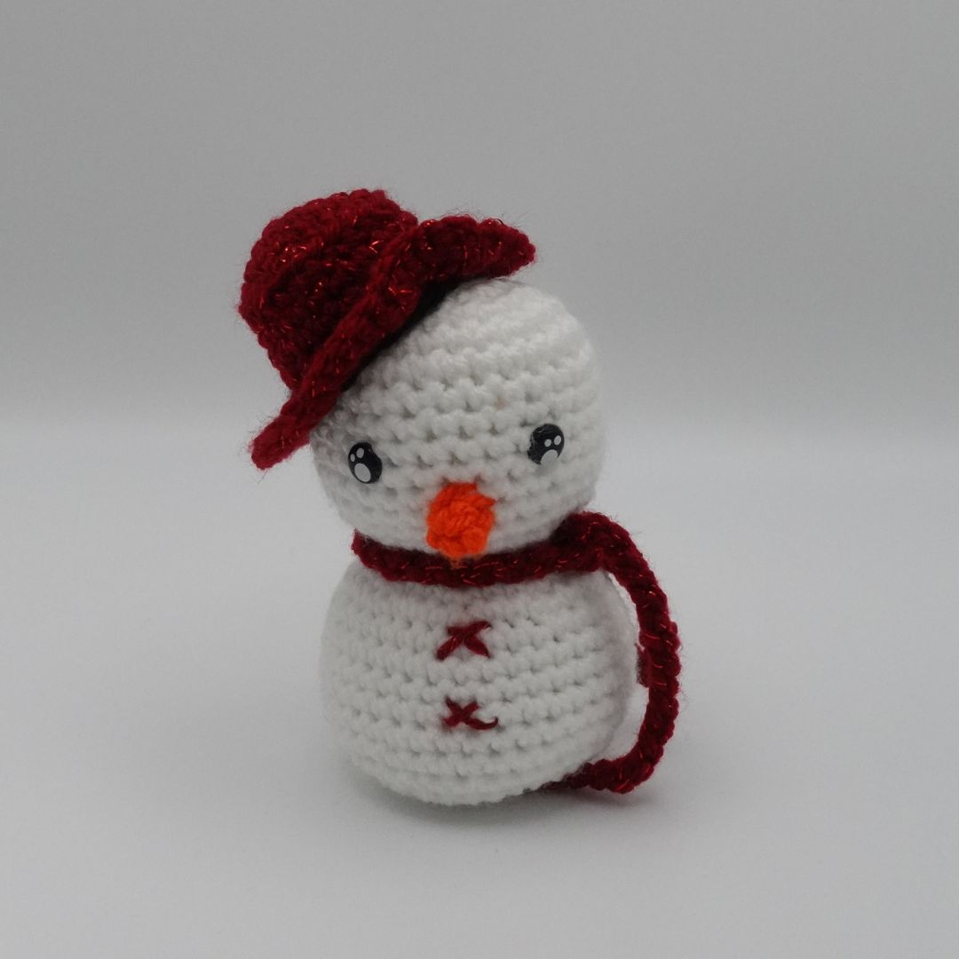 Bonhomme de neige chapeau rouge